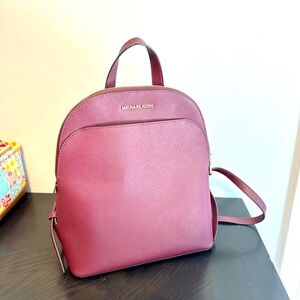 Michael Kors backpack. Perfect condition. Beautiful red wine color